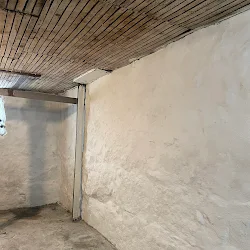 After: Basement walls repointed and parged